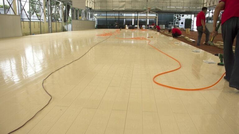 Synthetic hardwood floor for basketball