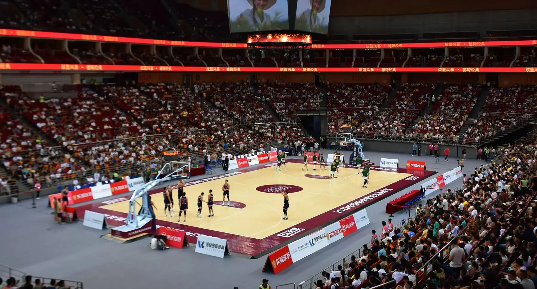 Basketball game in a packed indoor arena
