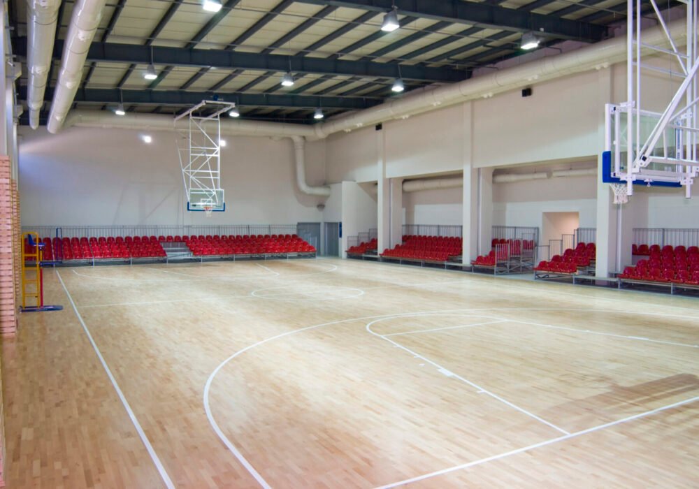 Photography of a large and empty basketball stadium